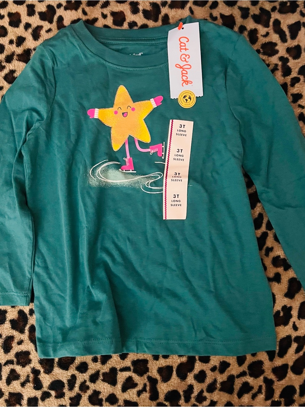 Cat & Jack Teal Long Sleeve Tee with Yellow Ice Skating Star